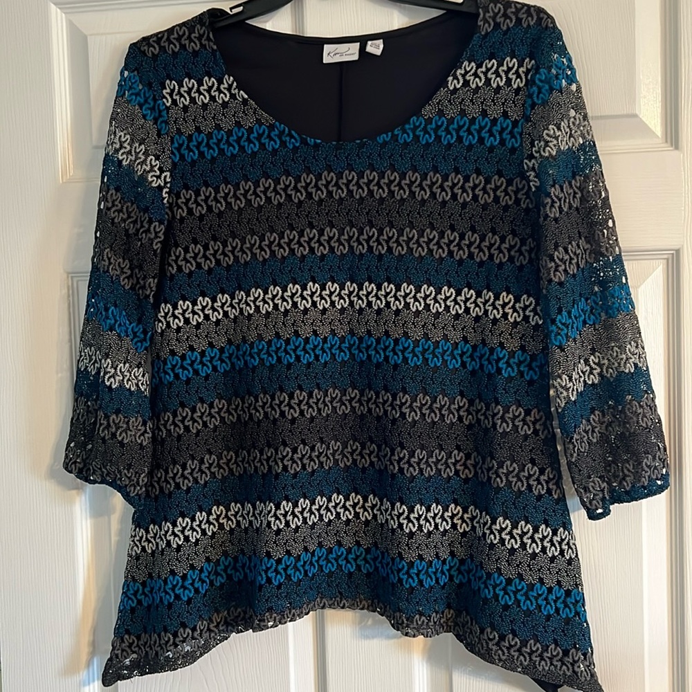 Blue, black, and white top